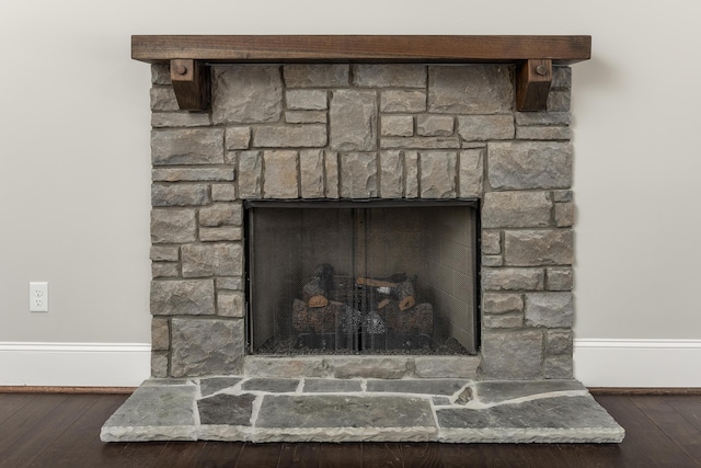 details featuring a stone fireplace