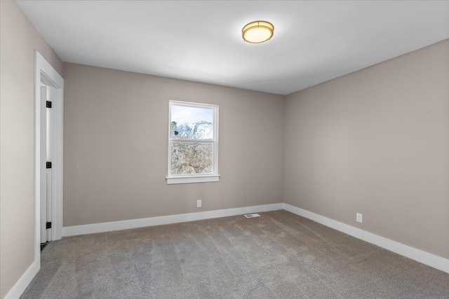 empty room featuring carpet floors