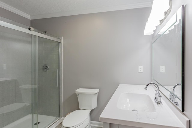 bathroom with crown molding, toilet, vanity, a stall shower, and a textured ceiling