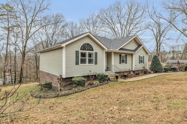 view of front of property with a front lawn