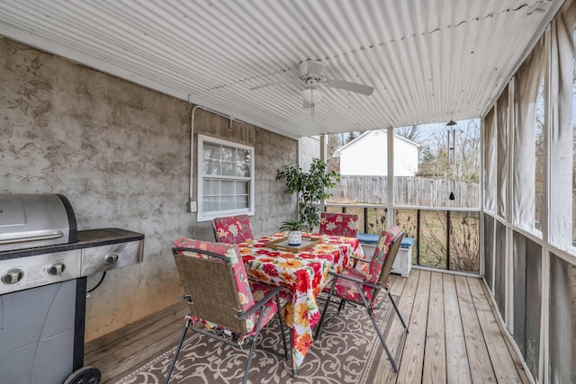 sunroom / solarium with ceiling fan