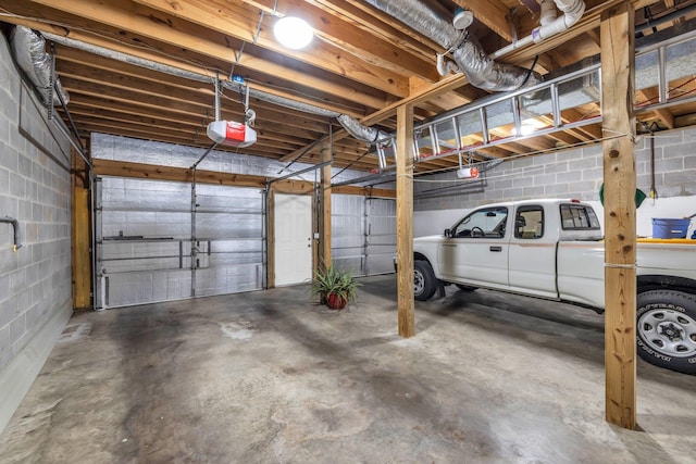 garage featuring a garage door opener