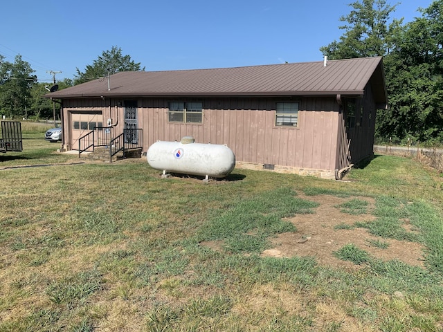 view of outdoor structure with a lawn