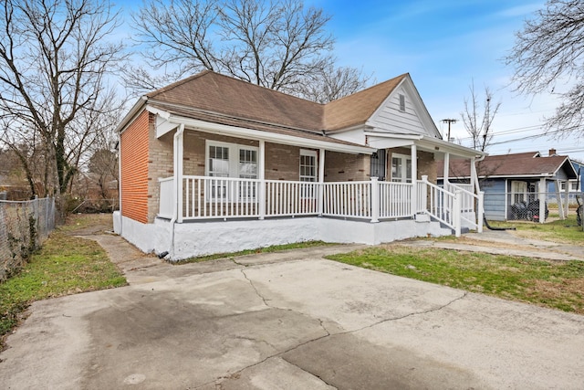 bungalow-style home with covered porch