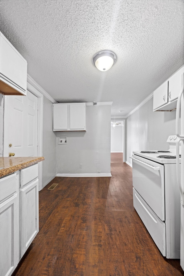 kitchen featuring crown molding, white electric range oven, and white cabinetry