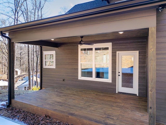 wooden deck with ceiling fan