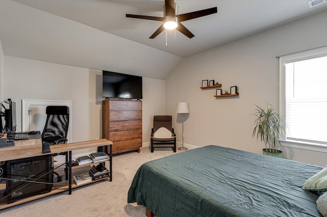 bedroom featuring lofted ceiling, light colored carpet, and ceiling fan