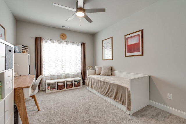 bedroom with light colored carpet and ceiling fan