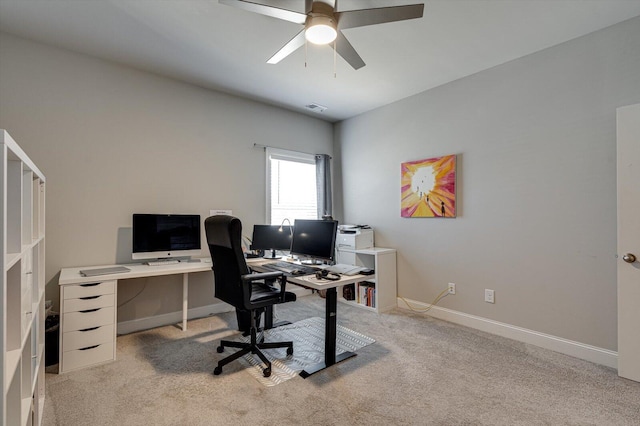 home office with light colored carpet and ceiling fan