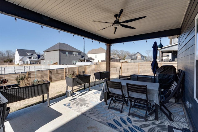 view of patio featuring ceiling fan