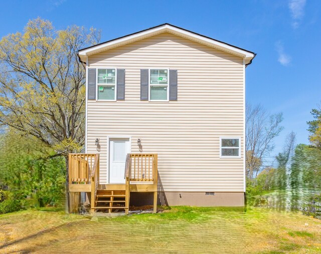 1006 Mcbrien Rd, Chattanooga, TN 37412 - rear view of property featuring a wooden deck, crawl space, stairs, and a yard