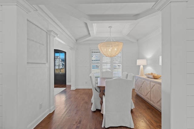 dining space featuring an inviting chandelier, dark hardwood / wood-style floors, ornamental molding, and coffered ceiling