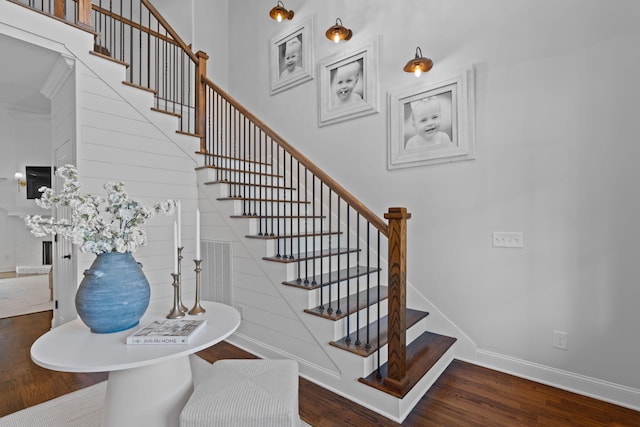 stairs with wood-type flooring