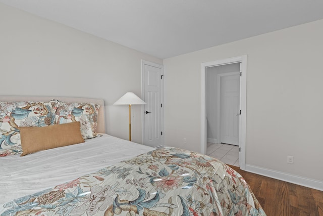 bedroom with light hardwood / wood-style flooring