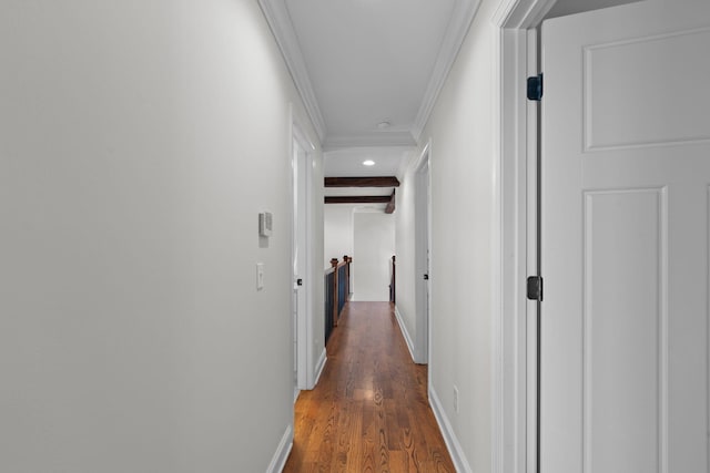 hall with dark hardwood / wood-style flooring, crown molding, and beamed ceiling