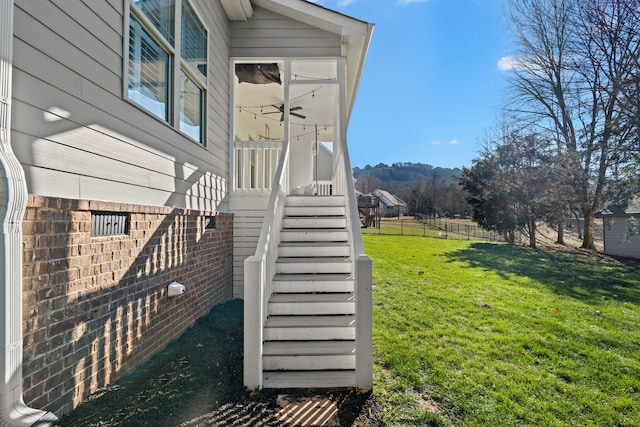 view of home's exterior with a lawn