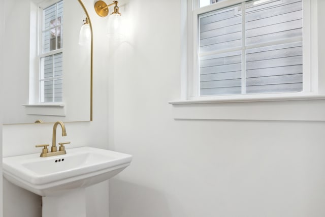 bathroom with sink and a healthy amount of sunlight