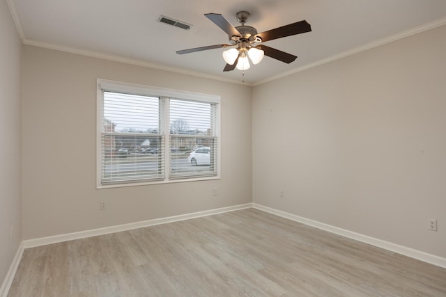 unfurnished room featuring light hardwood / wood-style floors, crown molding, and ceiling fan