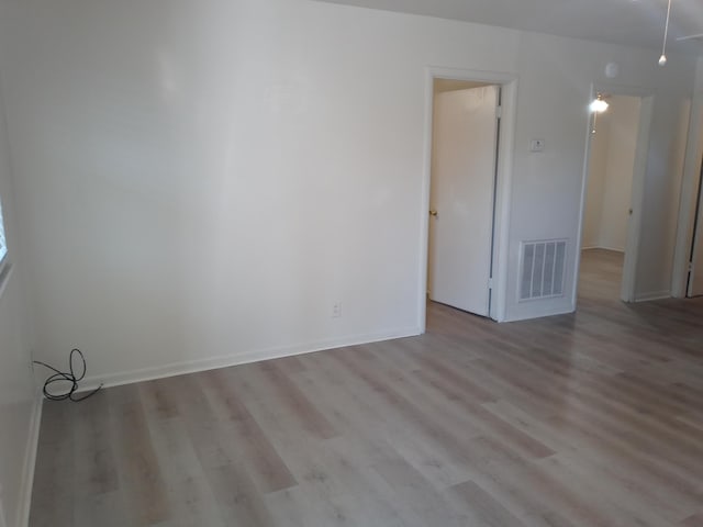 empty room with light wood-type flooring