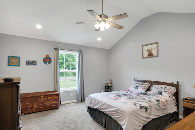 carpeted bedroom featuring ceiling fan and lofted ceiling