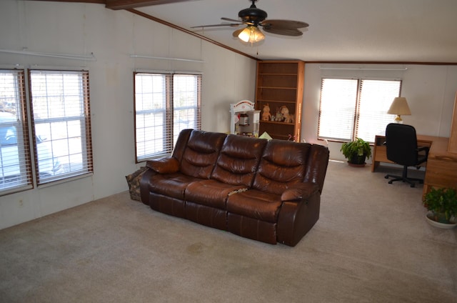 living room with ceiling fan, carpet, and lofted ceiling with beams