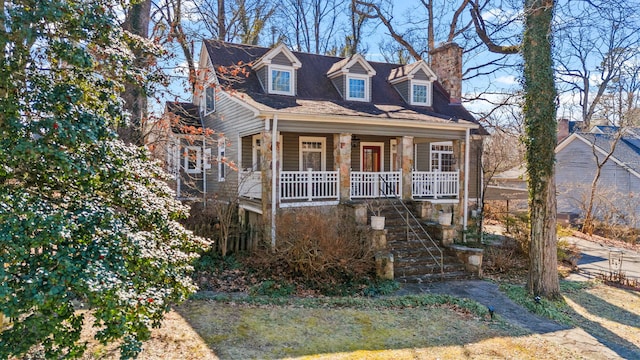 cape cod house with covered porch