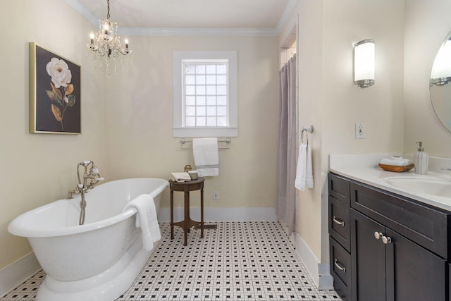 bathroom featuring crown molding, vanity, and a bathtub