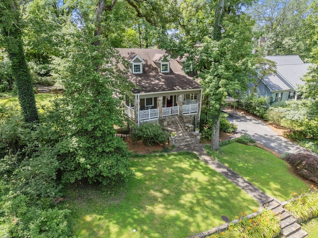 608 Texas Ave, Signal Mountain, TN 37377 - cape cod-style house featuring covered porch and a front yard