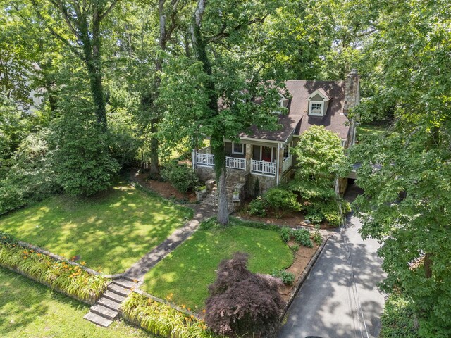 608 Texas Ave, Signal Mountain, TN 37377 - view of front of house with covered porch, a front yard, a chimney, stairway, and a shingled roof
