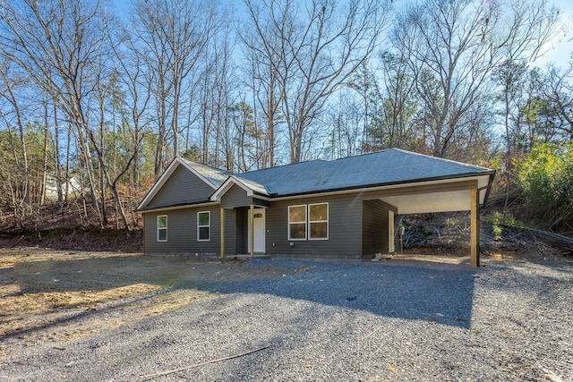 single story home with a carport