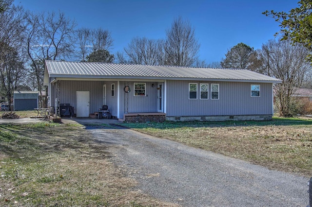 ranch-style house with a front yard