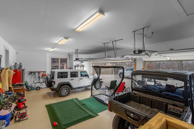 garage featuring a garage door opener