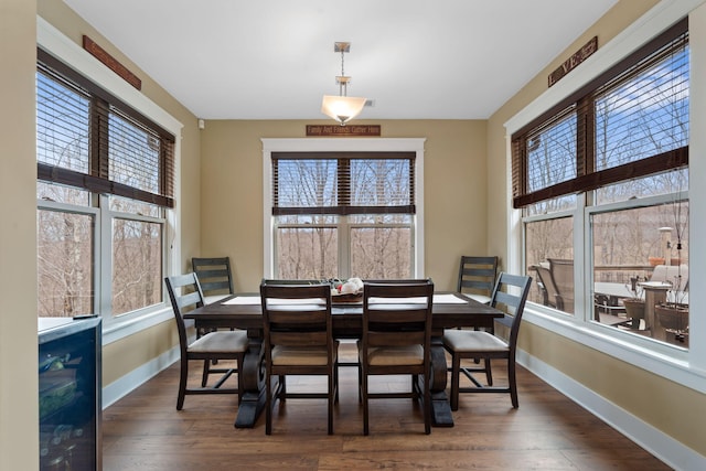 dining space featuring dark hardwood / wood-style flooring