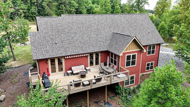 back of property featuring an outdoor hangout area, french doors, and a deck