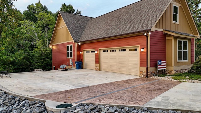 view of property exterior with a garage