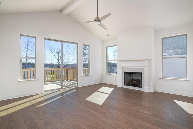 unfurnished living room with dark wood-type flooring, ceiling fan, and lofted ceiling with beams