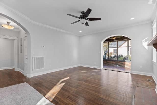 unfurnished living room featuring ceiling fan, crown molding, and dark hardwood / wood-style floors