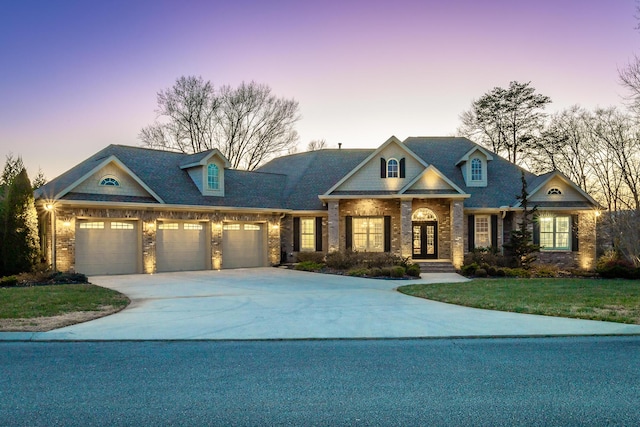 view of front of property with a garage