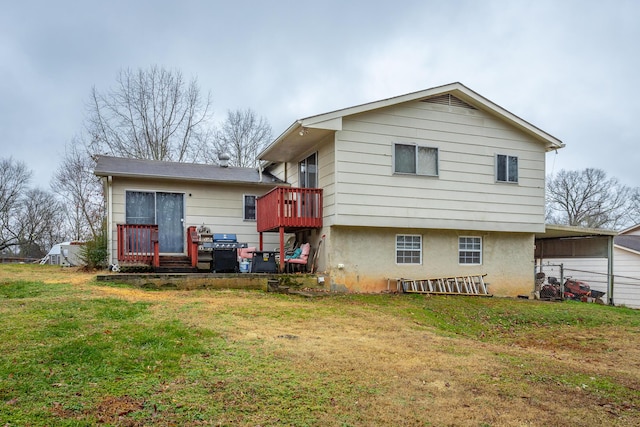 back of house featuring a yard