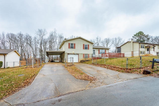 view of front of house with a garage and a front lawn