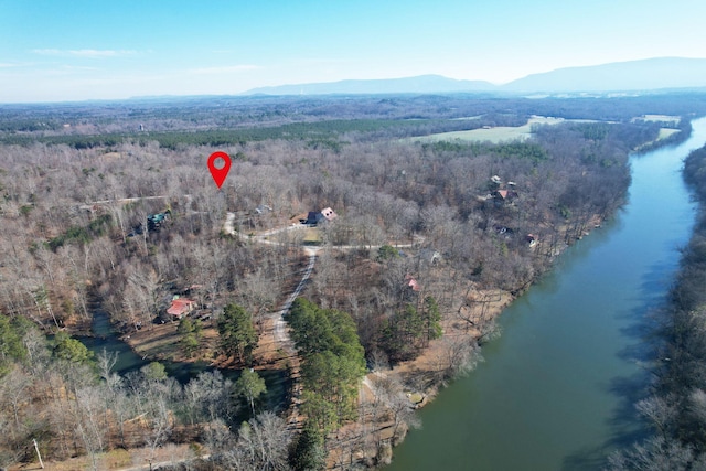 bird's eye view with a water and mountain view