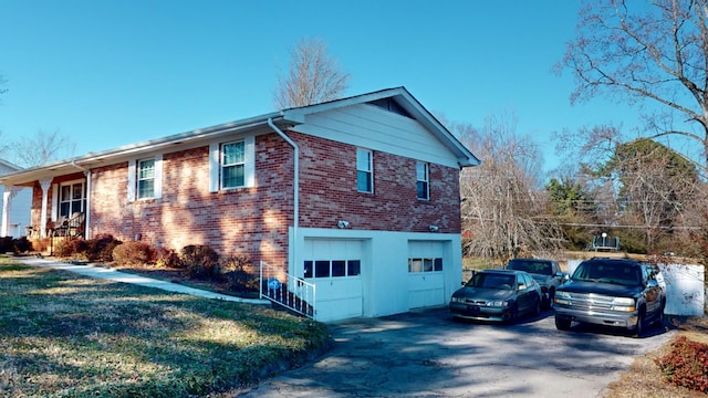 view of side of property featuring a garage