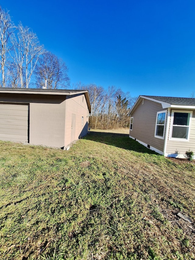 view of yard featuring a garage