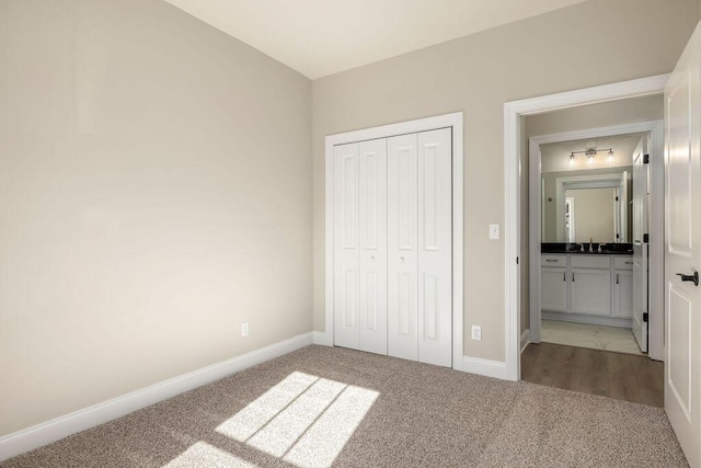 1691 Whisper Winds Ln Unit 35, Ooltewah, TN 37363 - unfurnished bedroom featuring carpet flooring and a closet