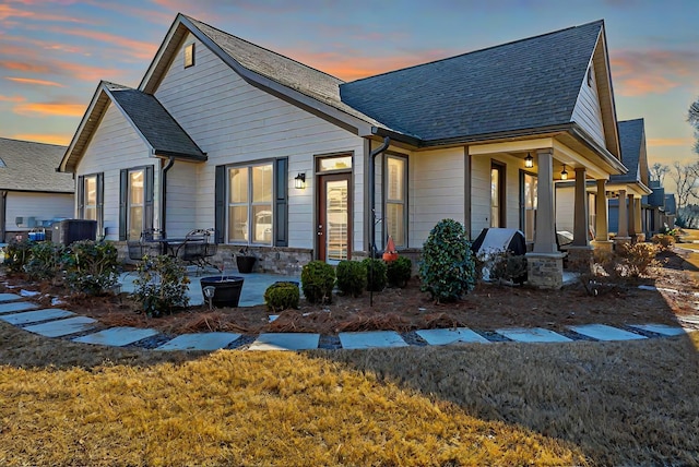 view of front of home with a lawn