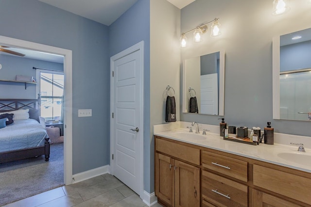 bathroom featuring ceiling fan, tile patterned floors, and vanity