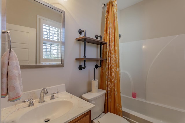 full bathroom featuring toilet, vanity, and shower / bathtub combination with curtain