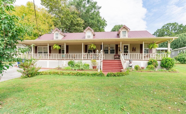 country-style home featuring a front lawn and a porch