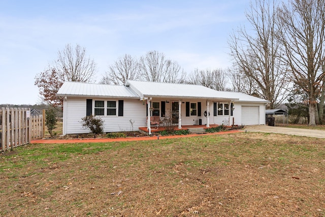 ranch-style house with a front yard, a porch, and a garage