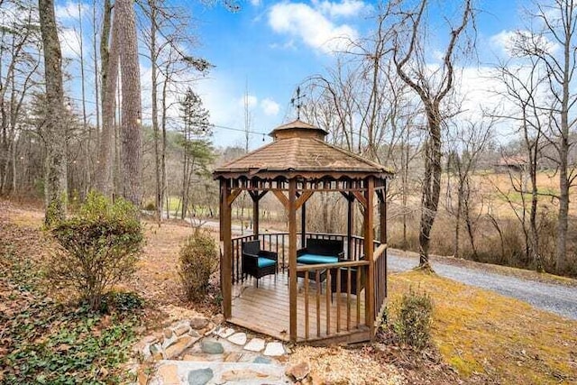 wooden terrace with a gazebo